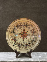 Nature-inspired design on Plate in Kashmiri Paper Mache